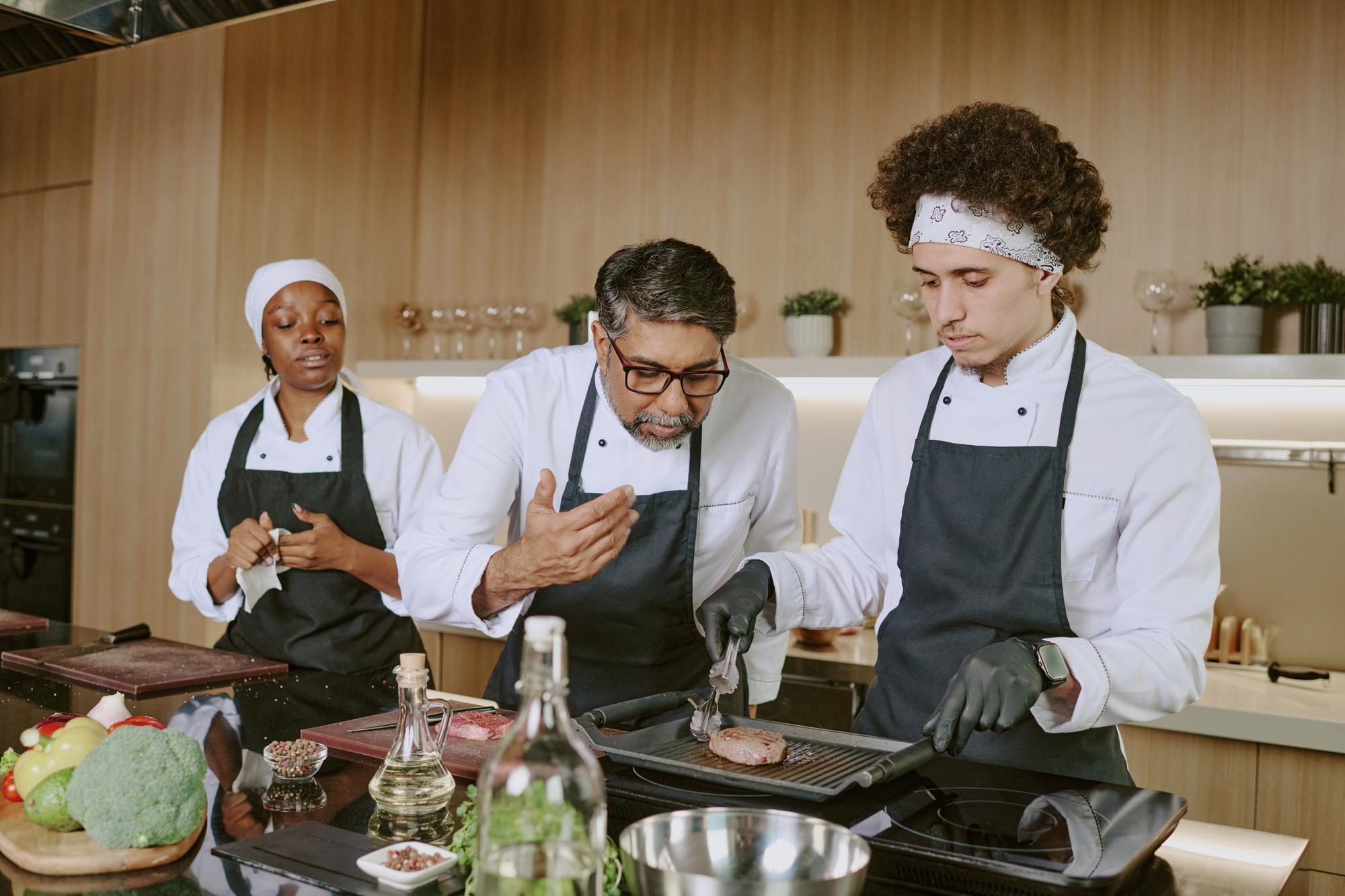Open kitchen with chefs collaborating